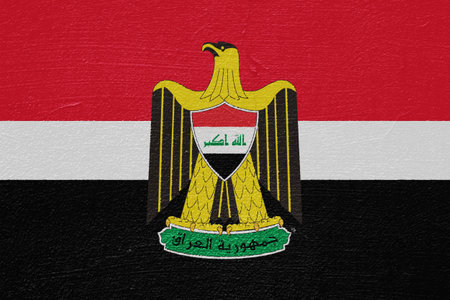 Flag and coat of arms of the Republic of Iraq on a textured background. Concept collage.の写真素材