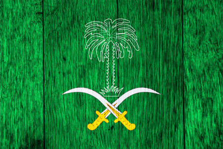 Flag and coat of arms of the Kingdom of Saudi Arabia on a textured background. Concept collage.の写真素材