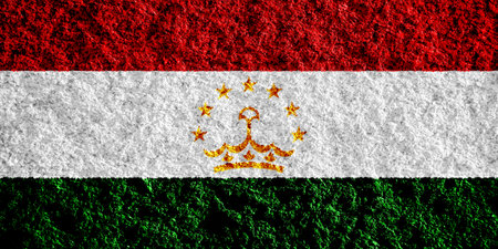 Flag of Republic of Tajikistan on a textured background. Concept collage.の写真素材