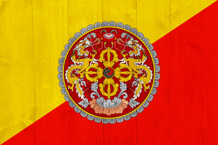 Flag and coat of arms of Kingdom of Bhutan on a textured background. Concept collage.の写真素材