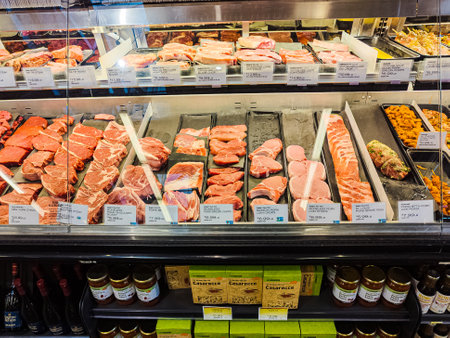 Portland, Oregon, USA - 06/11/2023: Fresh meat in a supermarket refrigerated display case New Seasons.のeditorial素材