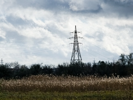 High voltage towers on skies background. Transmission line tower.の写真素材