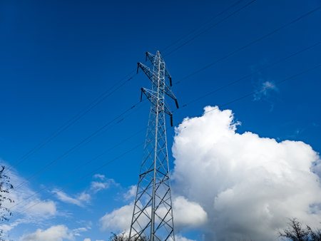 High voltage towers on skies background. Transmission line tower.の写真素材