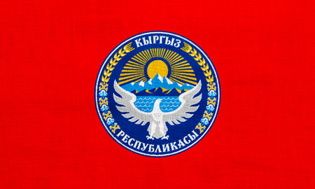 Flag and coat of arms of Kyrgyz Republic on a textured background. Concept collage.の写真素材