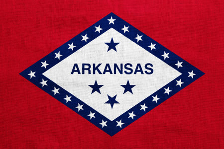 Flag of Arkansas state USA flag on a textured background. Concept collage.の写真素材