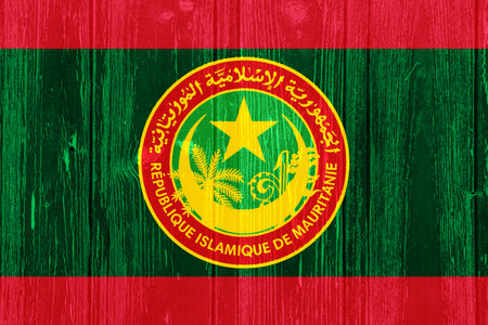 Flag and coat of arms of ISLAMIC REPUBLIC OF MAURITANIA on a textured background. Concept collage.の写真素材