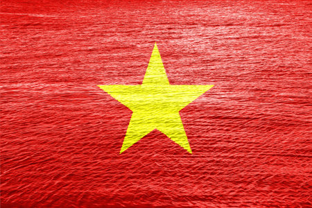 Flag of Socialist Republic of Vietnam on a textured background. Concept collage.の写真素材