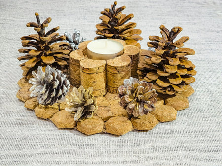 New Year's Candlestick made of wine corks and painted pine cones. Handmade.の写真素材