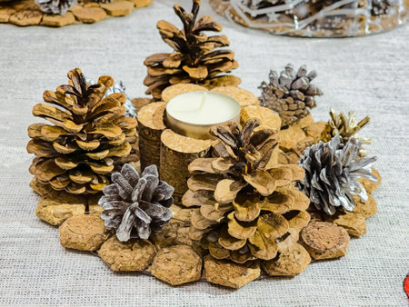 New Year's Candlestick made of wine corks and painted pine cones. Handmade.の写真素材