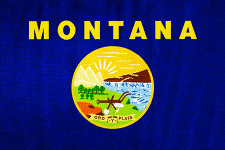Flag of Montana USA state on a textured background. Concept collage.の写真素材