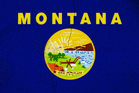 Flag of Montana USA state on a textured background. Concept collage.の写真素材