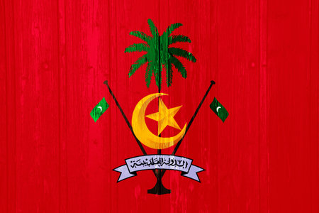 Flag and coat of arms of the Republic of Maldives on a textured background. Concept collage.の写真素材
