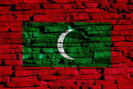 Flag of Republic of Maldives on a textured background. Concept collage.の写真素材