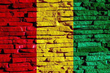 Flag of Republic of Guinea on a textured background. Concept collage.の写真素材