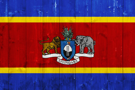 Flag and coat of arms of Kingdom of Eswatini on a textured background. Concept collage.の写真素材
