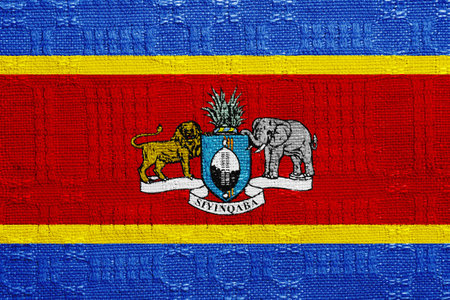 Flag and coat of arms of Kingdom of Eswatini on a textured background. Concept collage.の写真素材