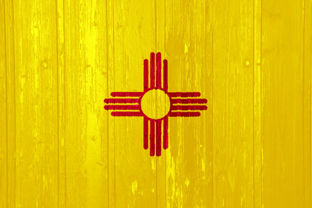 Flag of New Mexico state USA on a textured background. Concept collage.の写真素材