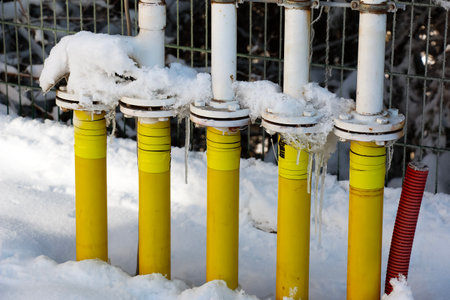 The fuel inlet pipelines at the gas station froze.の写真素材