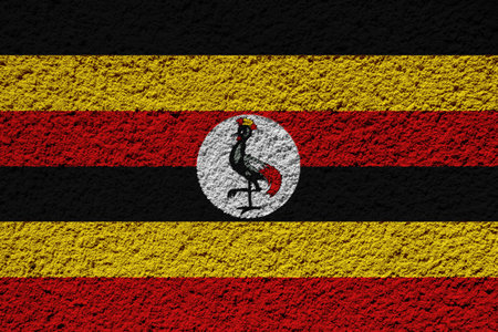 Flag of Republic of Uganda on a textured background. Concept collage.の写真素材