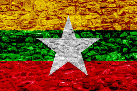 Flag of the Republic of the Union of Myanmar on a textured background. Concept collage.の写真素材