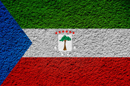 Flag of Republic of Equatorial Guinea on a textured background. Concept collage.の写真素材