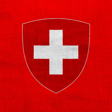 Flag and coat of arms of Swiss Confederation a textured background. Concept collage.の写真素材