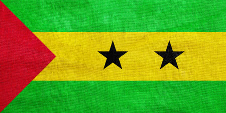 Flag of Democratic Republic of Sao Tome and Principe on a textured background. Concept collage.の写真素材