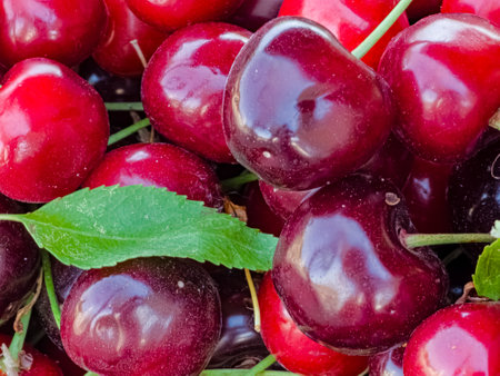 Delicious ripe sweet cherries as background, top view.の写真素材