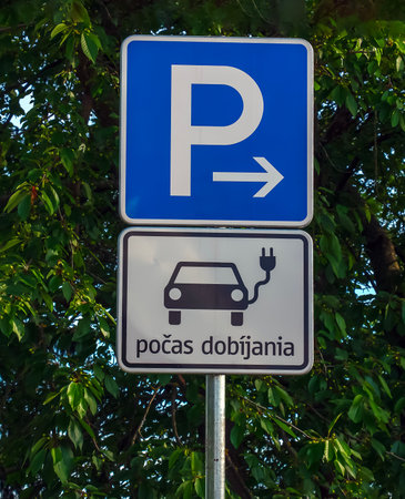 Sign Only parking and charging of electric vehicles in Slovak. City reserve spaces are for electric...