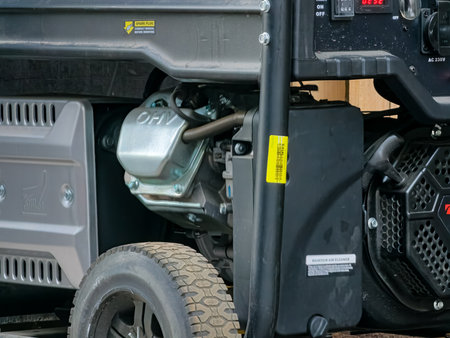 Power supply generator placed on street sidewalk. Outdoor diesel power generator in Ukraine.