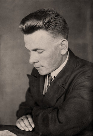 Vintage portrait of a passive young man. Retro photo from 1936.