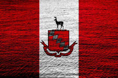 Flag of the city of Raleigh, North Carolina, USA, on a background of the water surface. Conceptual collage.の写真素材