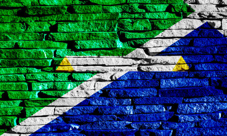 Flag of the city of Fishers, Indiana, USA, on a background of the stone wall. Conceptual collage.の写真素材