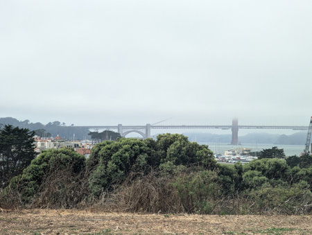 View of the Golden Gate Bridge in San Francisco, USA on a cloudy foggy day.の写真素材