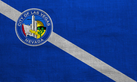 Flag of the city of Las Vegas, Nevada, USA, on a background of fabric texture. Conceptual collage.の写真素材