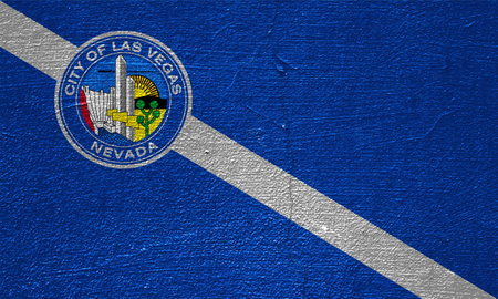 Flag of the city of Las Vegas, Nevada, USA, on a background of a cracked wall. Conceptual collage.の写真素材