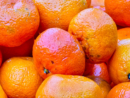 Ripe mandarins on the market. Fresh harvest of tangerines.の写真素材