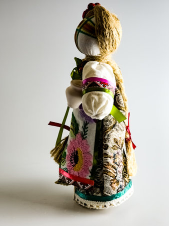 Handmade textile doll, Motanka rag doll in ethnic style. The tradition of folk crafts of the ancient culture of Ukraine. The most popular souvenirs from Ukraine.の写真素材