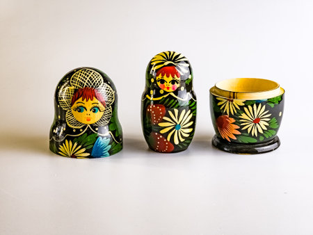 Matryoshka, Russian wooden doll on a white background. Painted with flowers. Revealed.の写真素材