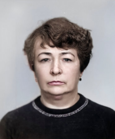 Vintage portrait of a beautiful middle-aged woman. Retro photograph from 1981.の写真素材