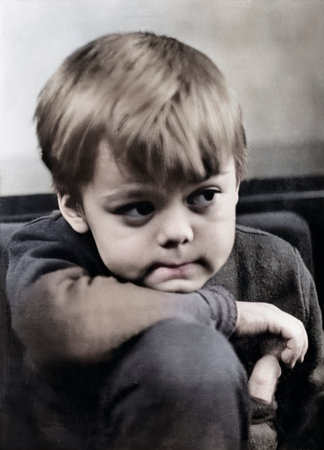 Vintage portrait of a little boy. Retro photo from 1972.