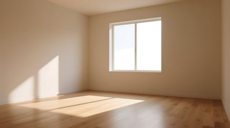 Minimalist empty room featuring light wooden floorboards and a large window, bathed in bright natural sunlightの素材