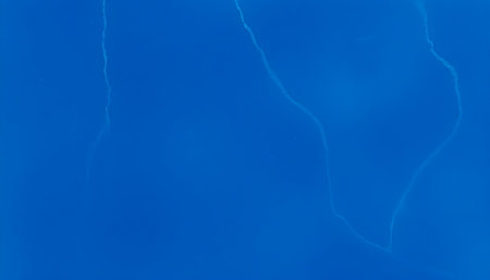 Abstract image in shades of deep blue, conveying a feeling of serenity and calmness in ocean waves.の素材