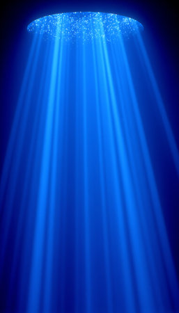Radiant blue light beams descend from a circular opening against a dark gradient background.の素材