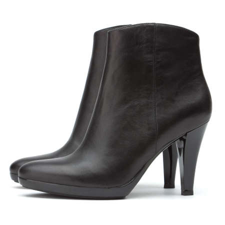 Ladies short black boots on a white backgroundの写真素材