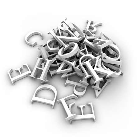 Latin letters poured into a heap, isolated on a white backgroundの写真素材