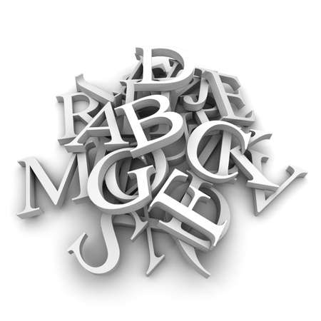 Latin letters poured into a heap, isolated on a white backgroundの写真素材