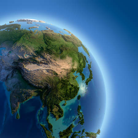 A fragment of the Earth with high relief, detailed surface, translucent ocean and atmosphere, illuminated by sunlightの写真素材