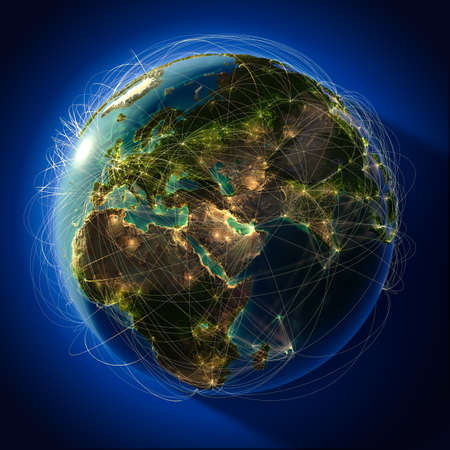 Highly detailed planet Earth at night, lit from behind the evening sun, with embossed continents, illuminated by light of cities, translucent and reflective ocean. Earth is surrounded by a luminous network, representing the major air routes based on real の写真素材