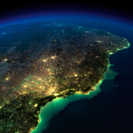 Highly detailed Earth, illuminated by moonlight  The glow of cities sheds light on the detailed exaggerated terrain and translucent water of the oceansの写真素材
